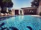 G&icirc;te &agrave; Montegrosso, Balagne, Haute-Corse, labellis&eacute; G&icirc;tes de France : l'espace piscine, cuisine d'&eacute;t&eacute; 
