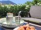 Gîte à Porto Vecchio, le Sud Corse, labellisé Gîtes de France : instant détente sur la terrasse à l'arrière de la maison Gîte à Porto Vecchio, le Sud Corse, labellisé Gîtes de France : instant détente sur la terrasse à l'arrière de la maison