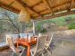 Gite &agrave; Figari, Le Sud Corse, en Corse du Sud, labelis&eacute; Gites de France : la terrasse avec le salon de jardin