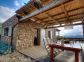 Gite &agrave; Figari, Le Sud Corse, en Corse du Sud, labelis&eacute; Gites de France : la terrasse avec le salon de jardin