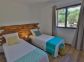 G&icirc;te &agrave; Porto Vecchio, Le Sud Corse, Corse du Sud, labellis&eacute; G&icirc;tes-de-France : la chambre avec les 2 lits simples